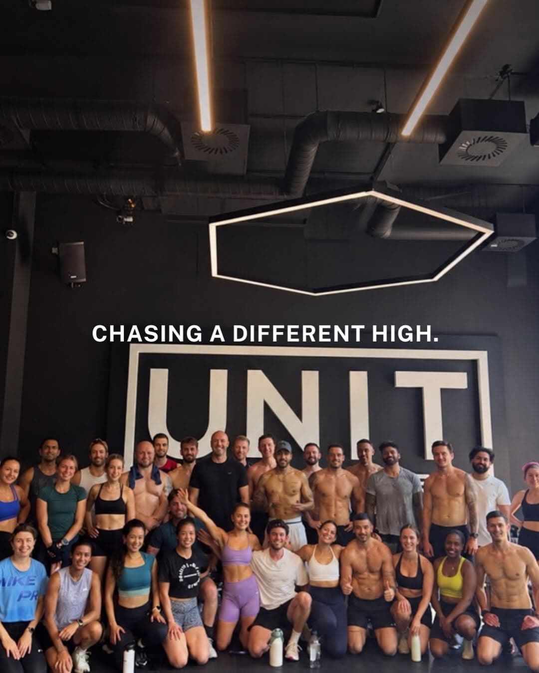 Group participating in a HYROX-style team workout followed by ice bath recovery and a social gathering with alcohol-free drinks